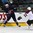 GRAND FORKS, NORTH DAKOTA - APRIL 17: USA's Kailer Yamamoto #23 plays the puck while Latvia's Tomass Zeile #5 defends during preliminary round action at the 2016 IIHF Ice Hockey U18 World Championship. (Photo by Matt Zambonin/HHOF-IIHF Images)

